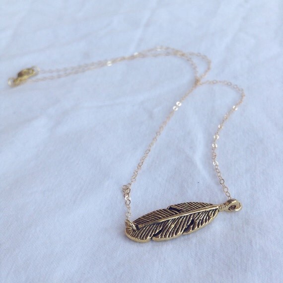 Gold Feather Necklace by PantomimeLionJewelry on Etsy