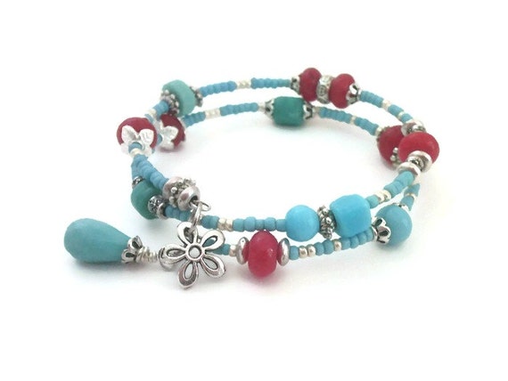 Turquoise blue, red beaded bracelet, silver flower charm, memory wire ...