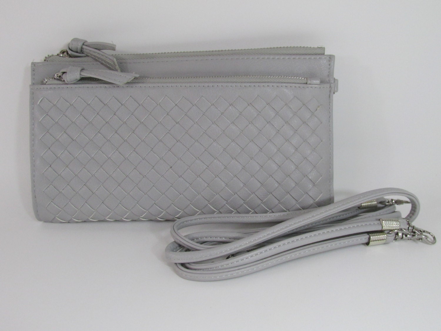 leather woven clutch