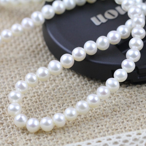 5-5.5mm AA round pearl strands supply from Chinagenuine pearl