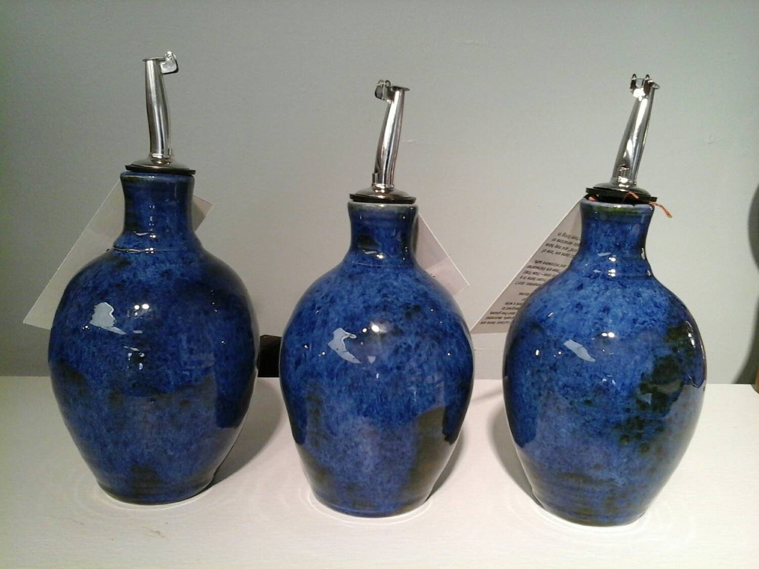 Oil or Vinegar Pottery Jars in blue with green and black