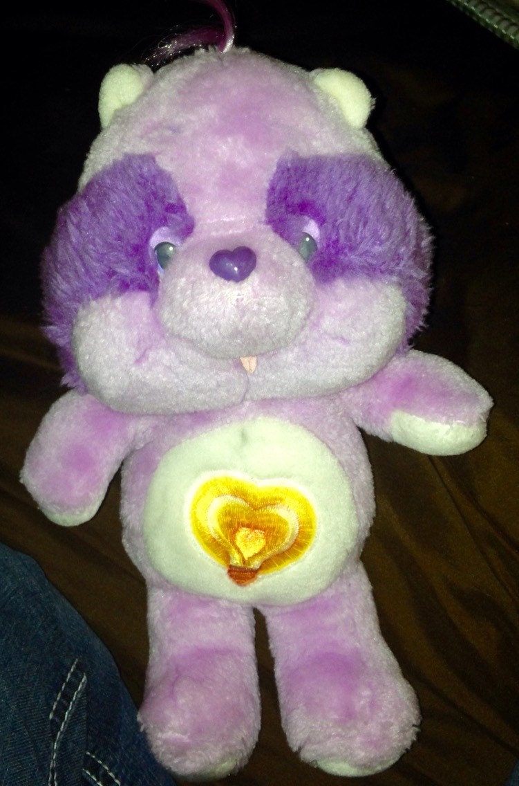 purple care bear raccoon