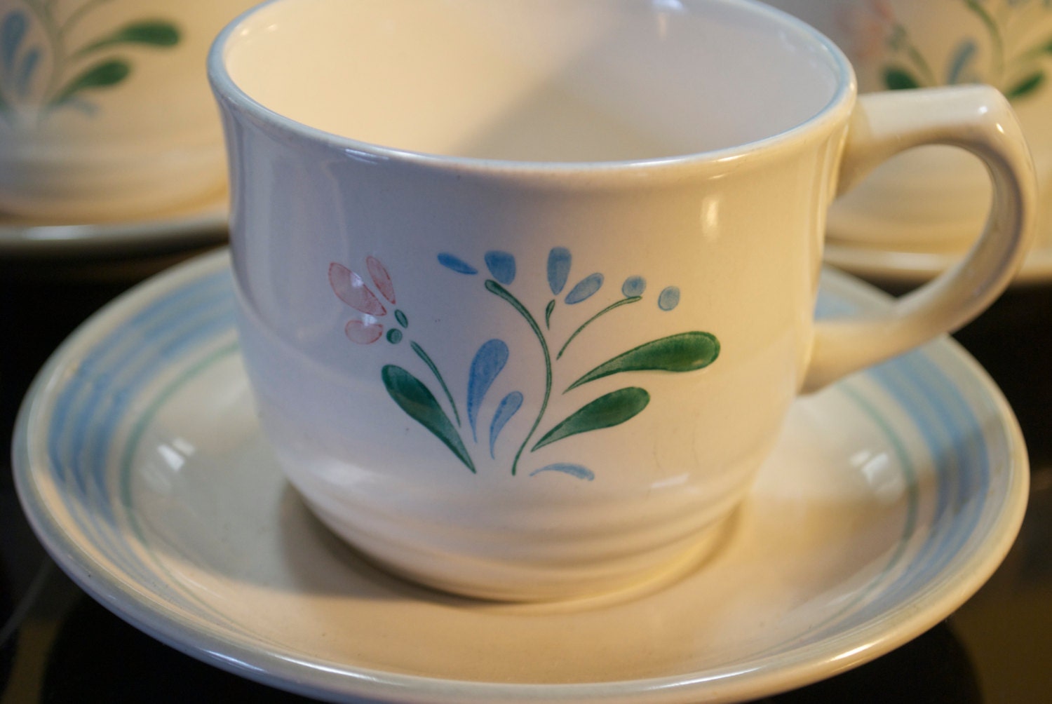 Vintage stoneware cup and saucer set from Yamaka, the Fascino pattern. Haute Juice