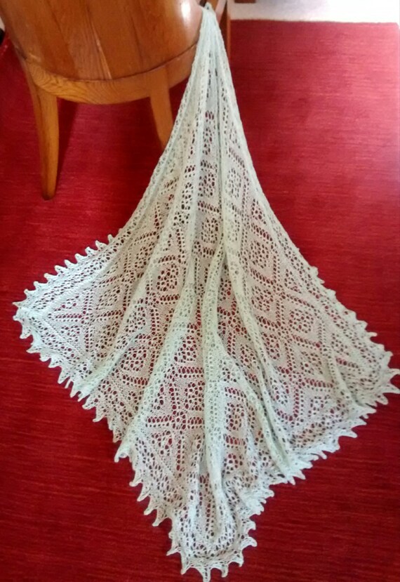 Hand knitted shetland lace baby shawl cobweb