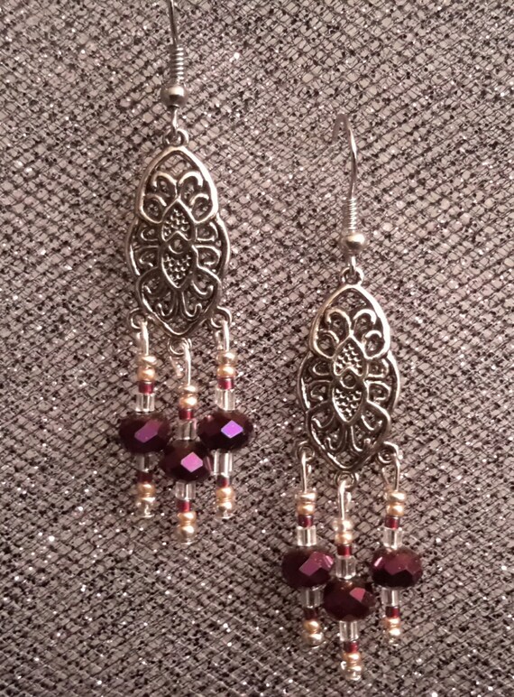 Items similar to Beautiful silver dangle earrings with dark metallic
