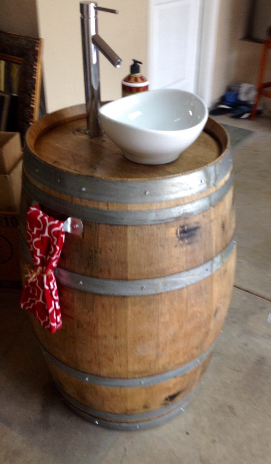 Wine barrel vessel sink vanity.