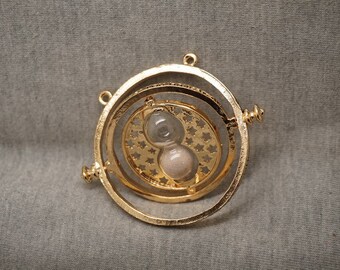 Golden Harry Potter Time Turner Time Converter Deathly Hallows Ornaments Charms Findings Pendants 55x48mm, for gifts