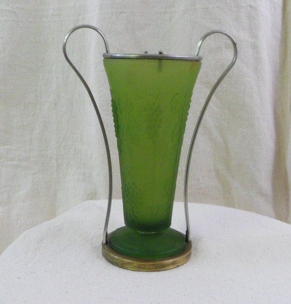 Vintage green satin glass vase with grape motif. Metal base and handles