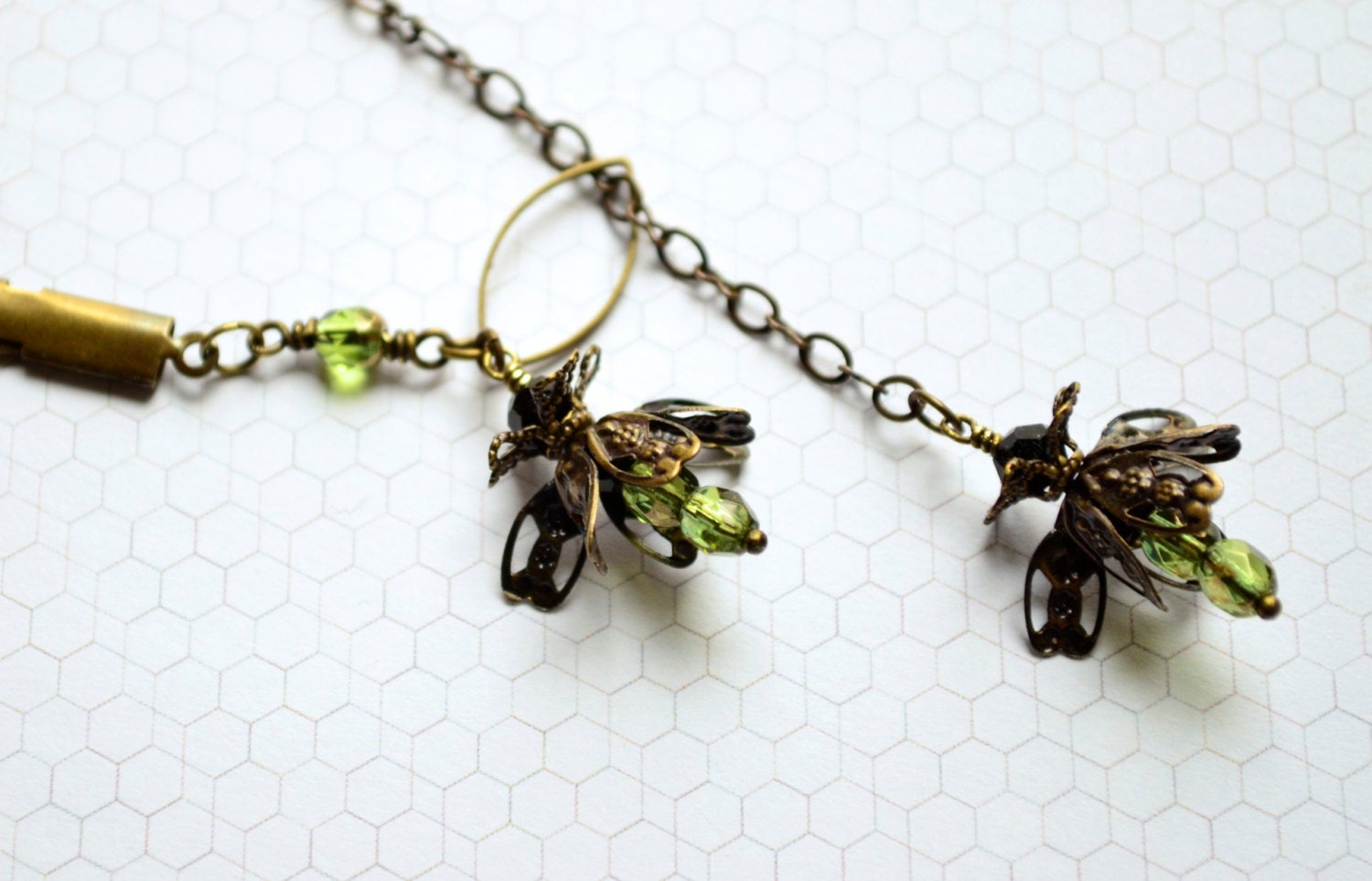 Firefly Necklace in brass and olive green Czech glass with