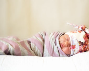 Baby girl swaddle blanket. Purple/ gray stripes. Soft and stretchy knit fabric. Size medium / 31 by 40 inches. Made by lippy brand. No pink