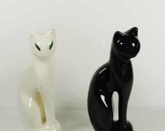 black and white cat figurines