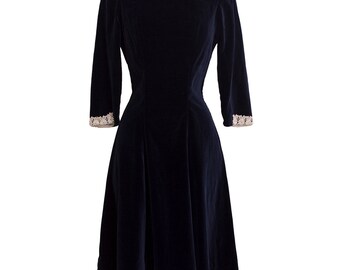 Items similar to Vintage black dress with aqua velvet bow collar on Etsy