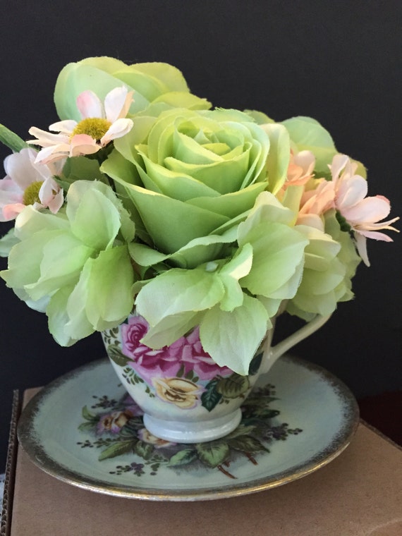 Items similar to Repurposed Vintage Tea Cup Flower Arrangement made