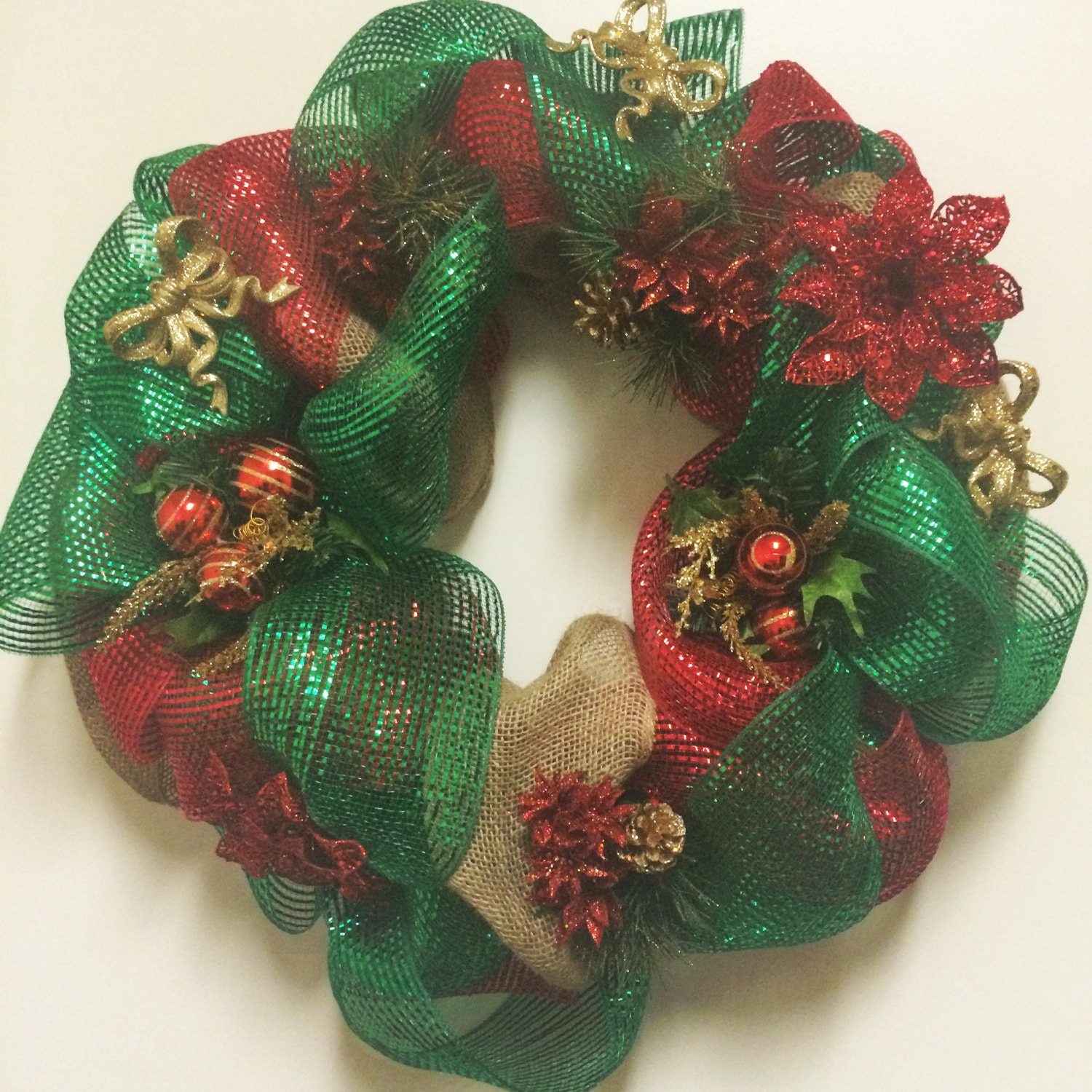 18'' red and green mesh & burlap wreath, appliques inserted throughout the wreath