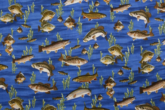 Items similar to On The Lake Fish Quilting Fabric on Etsy