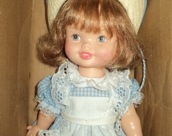 Vintage LITTLE DEBBIE DOLL, In Mint Condition in her wonderful blue and white gingham dress with white pinafore and signature straw hat - il_340x270.715905011_qhb7