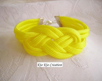 Costume jewel, mode(fashion), yellow bracelet sun, cordon braided flat textile fabric(tissue), chains of extension, silvered.
