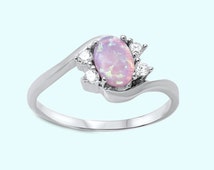 Popular items for pink fire opal ring on Etsy