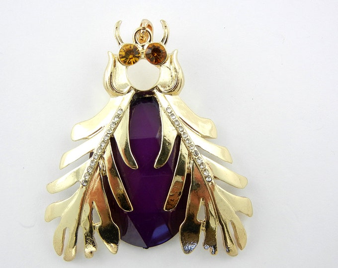 Large Gold-tone Beetle Pendant with Purple Acrylic Faceted Body Light Topaz Eyes