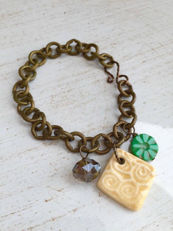 Items similar to Ceramic Charm Bracelet on Etsy
