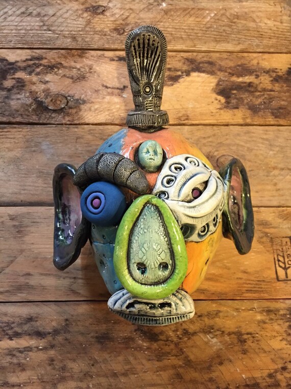 Ceramic Buddha mask oni wall hanging