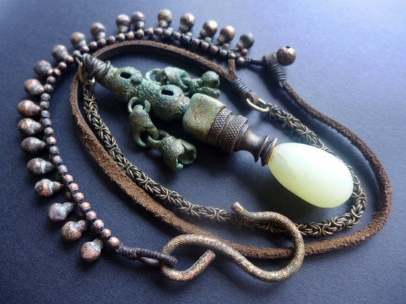 The Favors of the Moon. Long statement pendant necklace with finial and archaeological find.