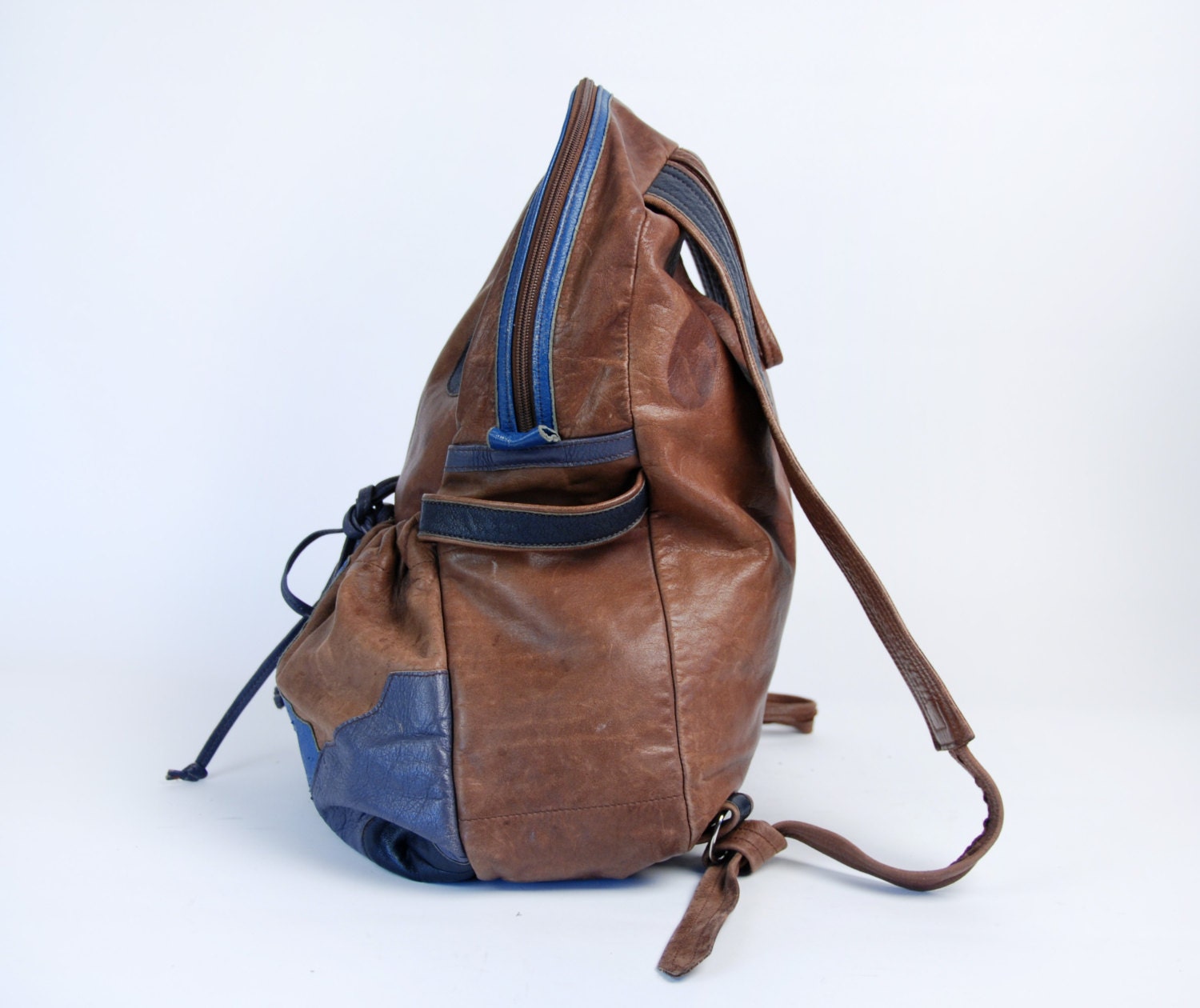 Brown and Blue Leather Backpack Mountain Scene