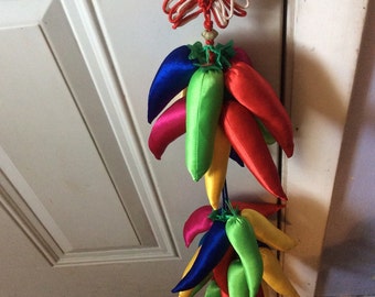 String of colorful cloth peppers with tassles vintage