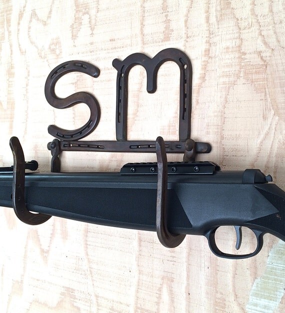 Custom Western gun rack personalized by BlacksmithCreations