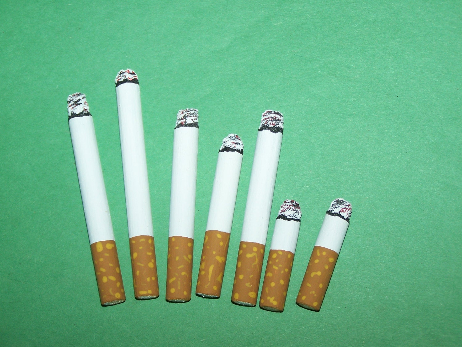 fake cigarettes/carvings/decoys/fake smokes/crafts/folk