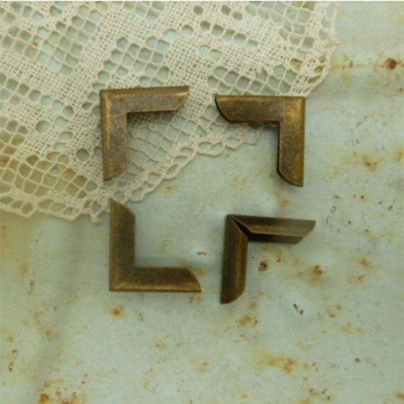 4 book corner protectors in simple aged brass or by bisbeebliss