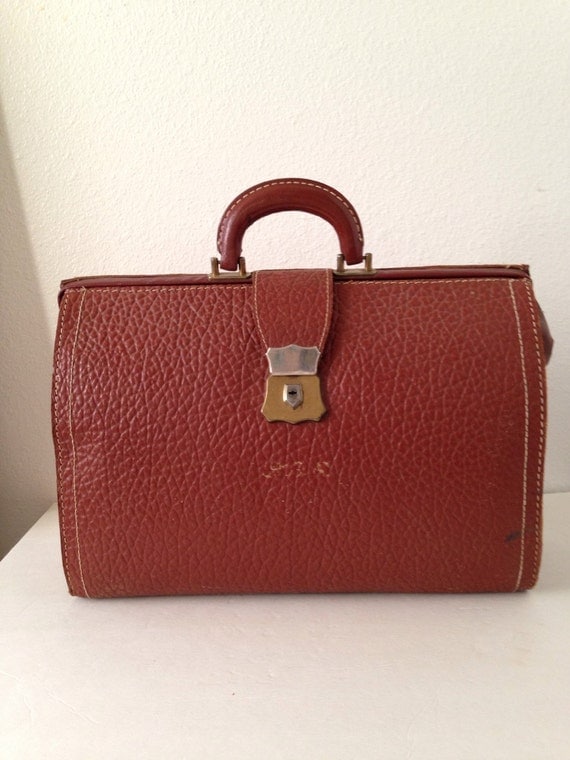 Items similar to 1970s Brown Leather Briefcase / School Bag on Etsy