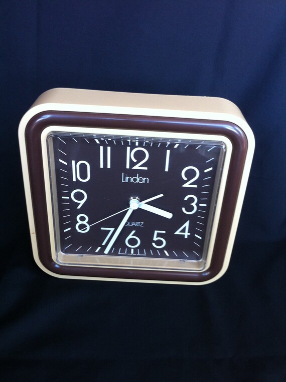 A Battery Operated Plastic Square Shaped Quart Wall Clock By