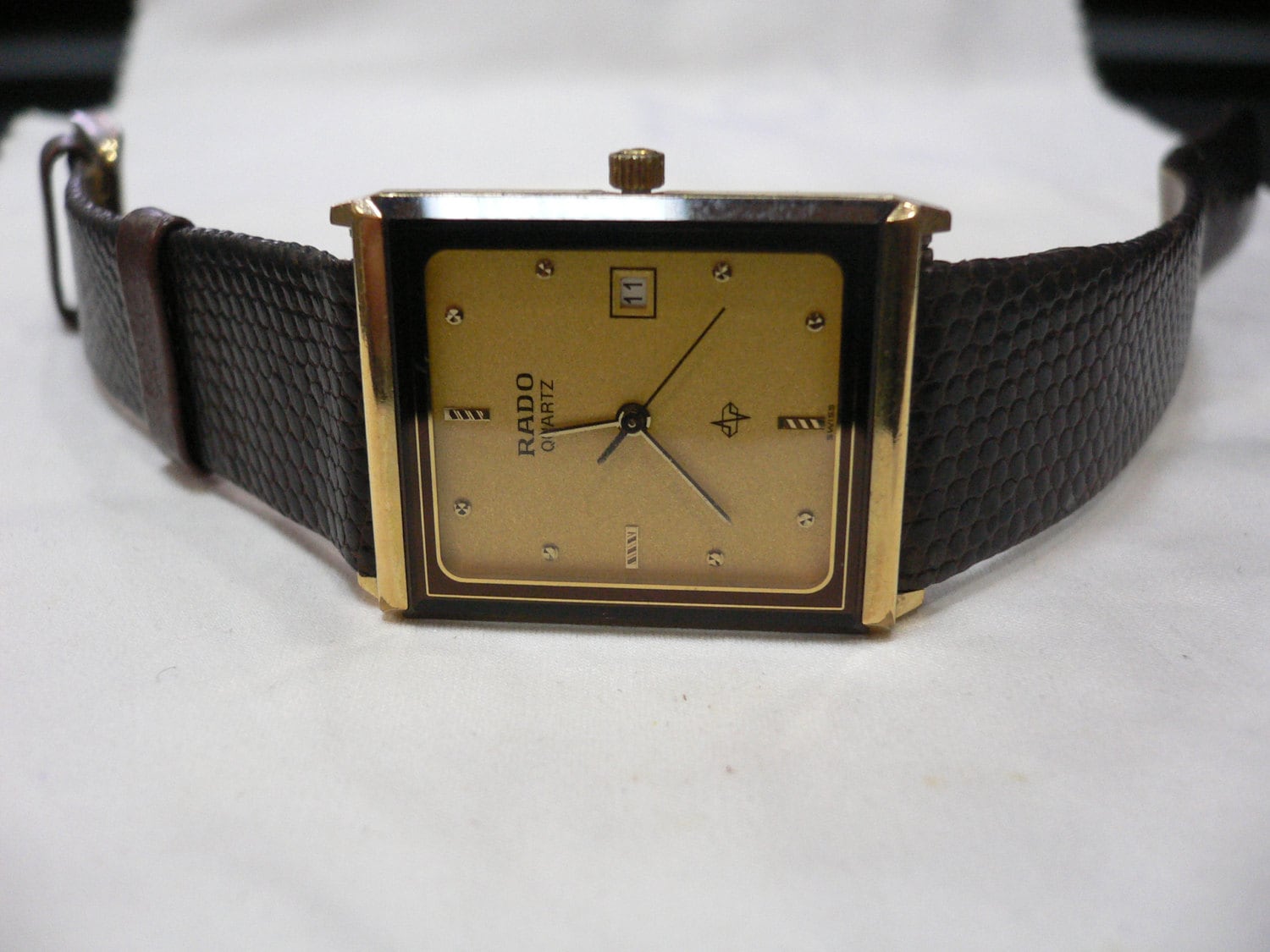 rado gold watch women