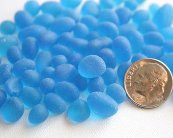 Go Green sea glass 25pcs plus of Frosted Ocean blue Sea Glass tiny pebbles good for Jewelry, any craft, vase filler (XS)