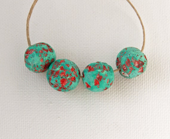 Primitive pitted polymer clay beads