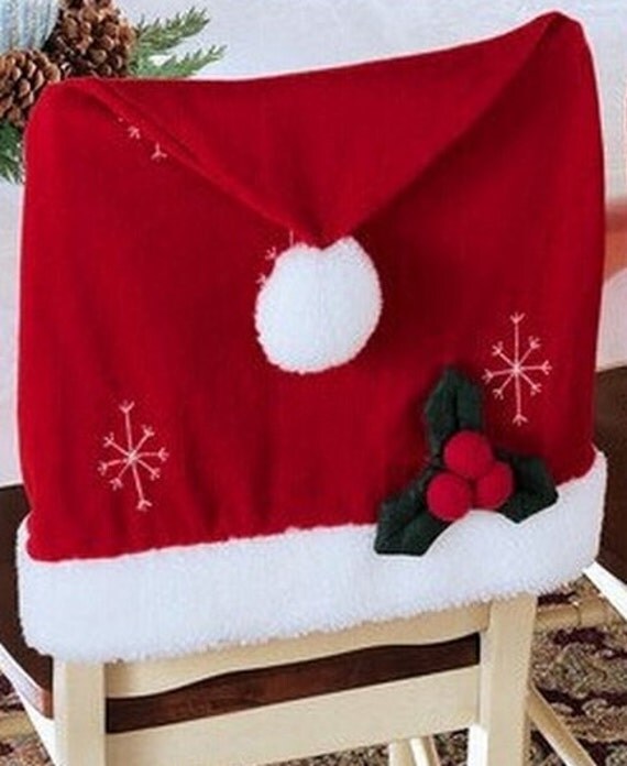 items similar to christmas santa claus hat chair cover items similar to christmas santa claus hat chair cover