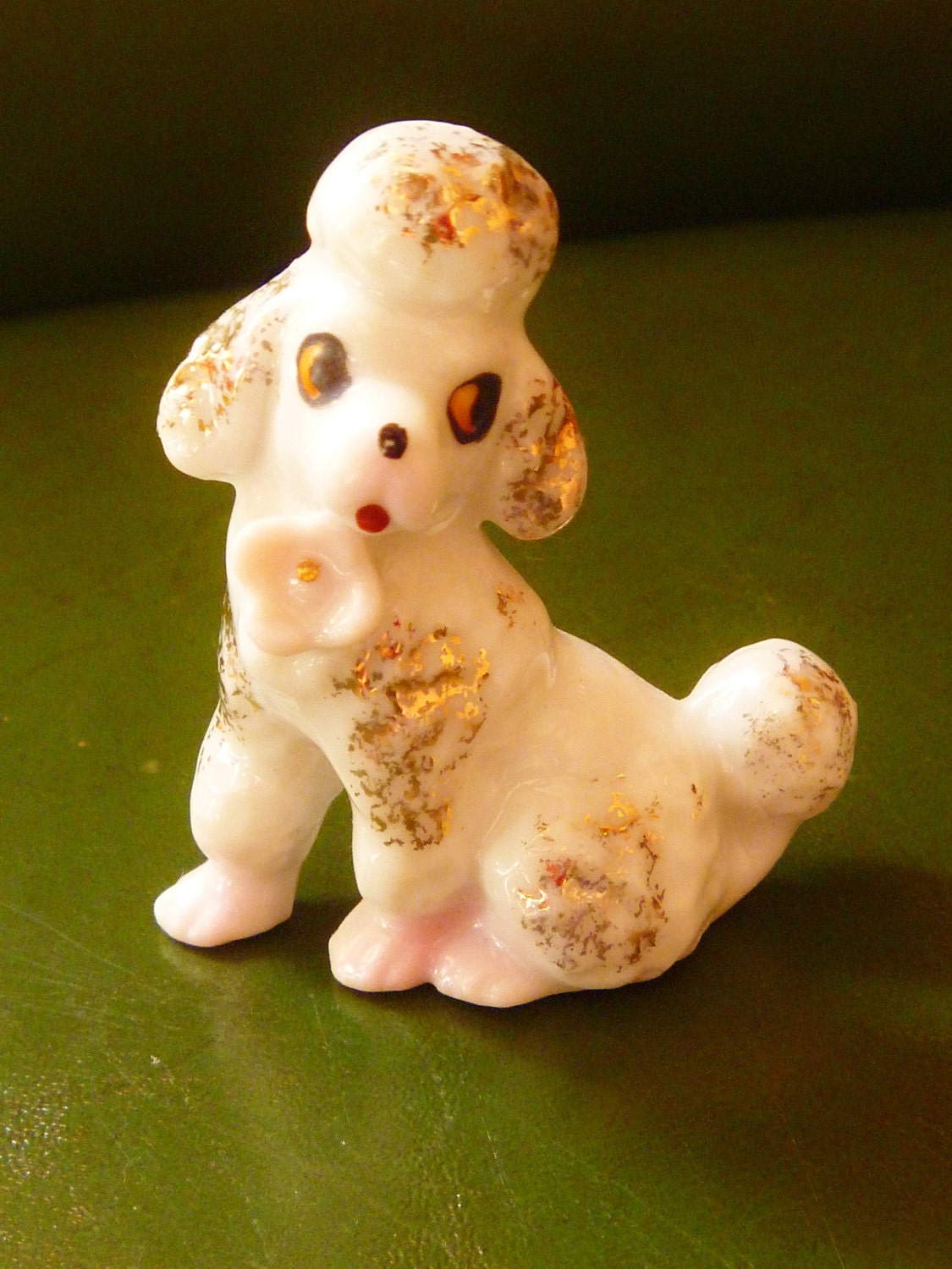 white ceramic poodle