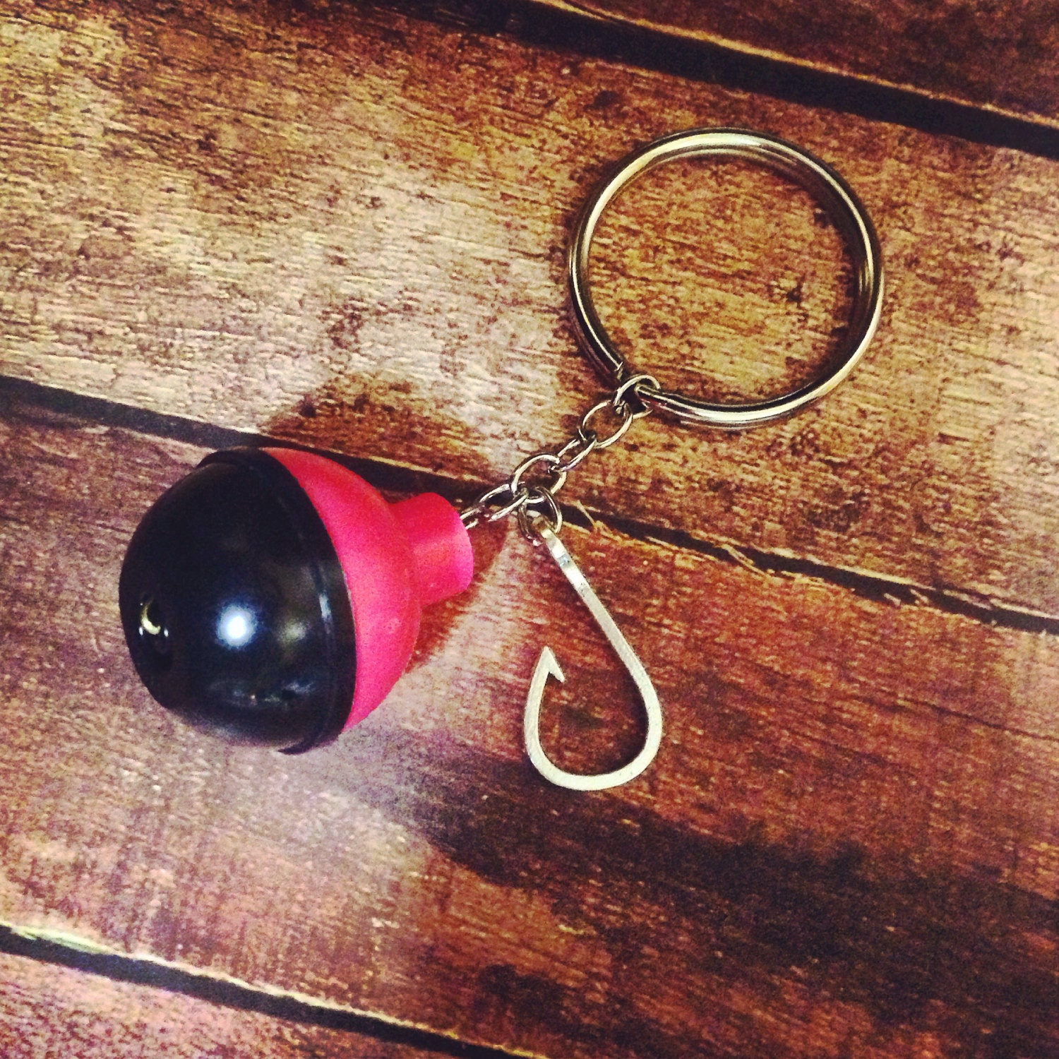 Pink/black bobber and fishing hook keychain