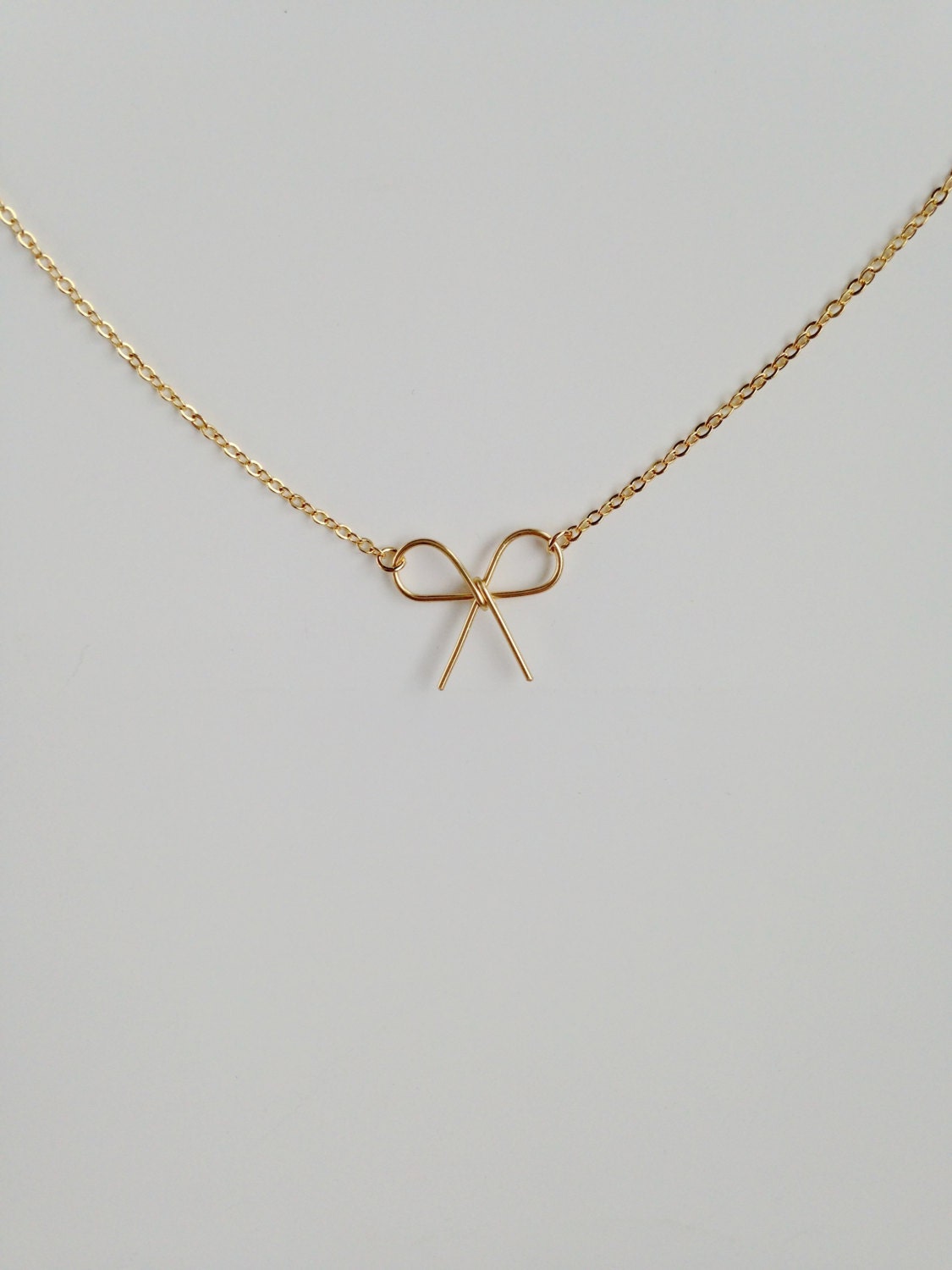 Gold Bow Necklace14K gold filled Bow by wirewirewire on Etsy