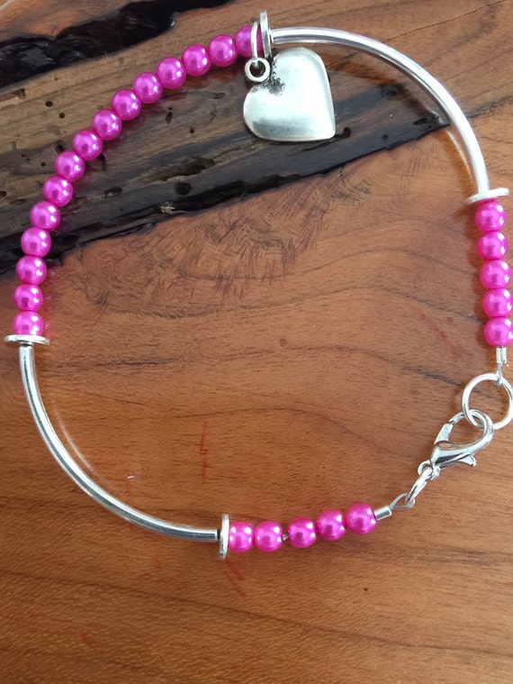 Items similar to Neon Pink Charm Bracelet on Etsy