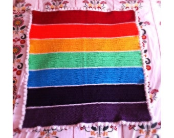 Rainbow baby blanket, crocheted in soft wool. Great for cot, crib, car seat, pushchair, pram or stroller.