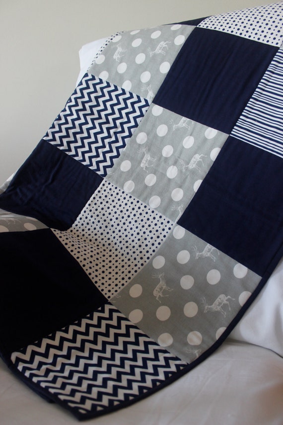 modern baby boy quilt grey and navy with elk print spots