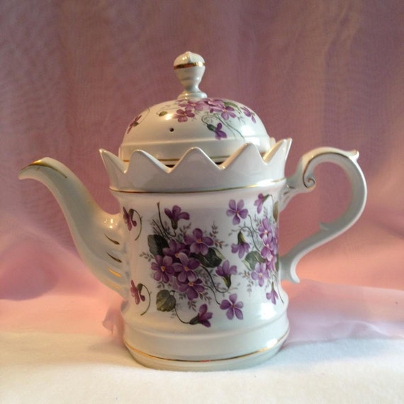 Tea pot with purple violet flowersCrown Dorset.