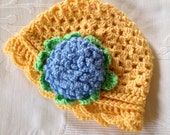 Hand crochet cloche style hat with flower embellishment. Unique & fun - with personality!