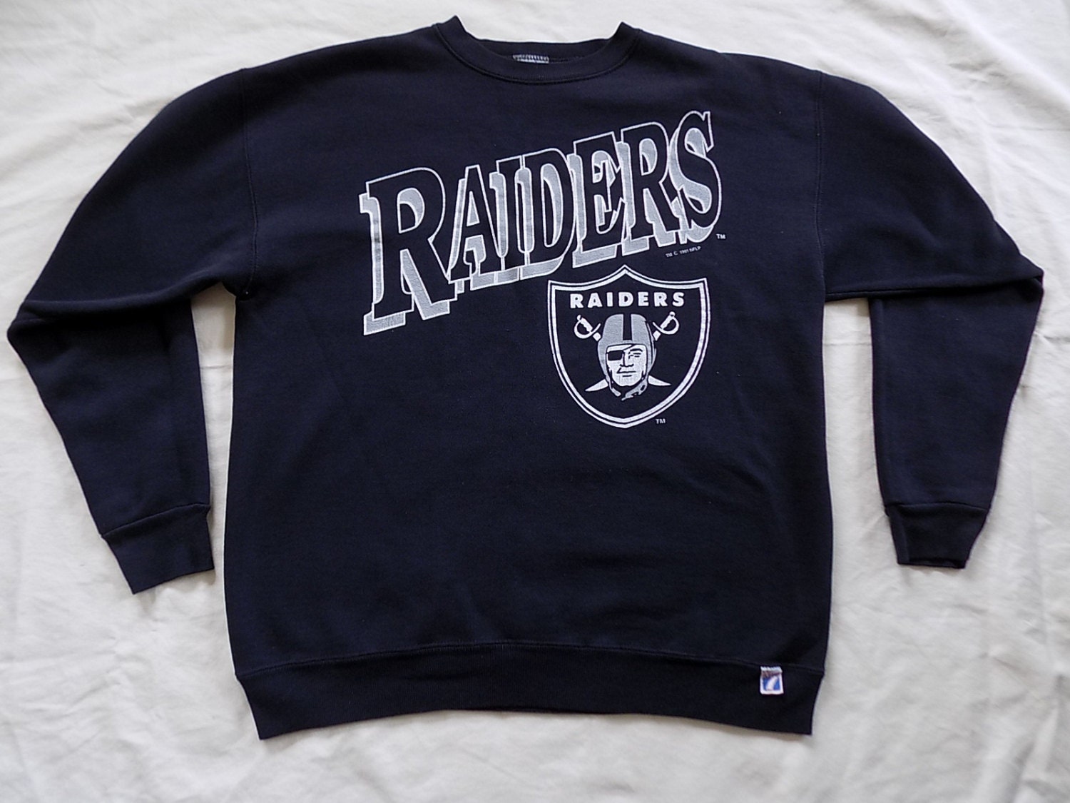 Vintage Oakland Raiders 7Logo Sweater Size Large