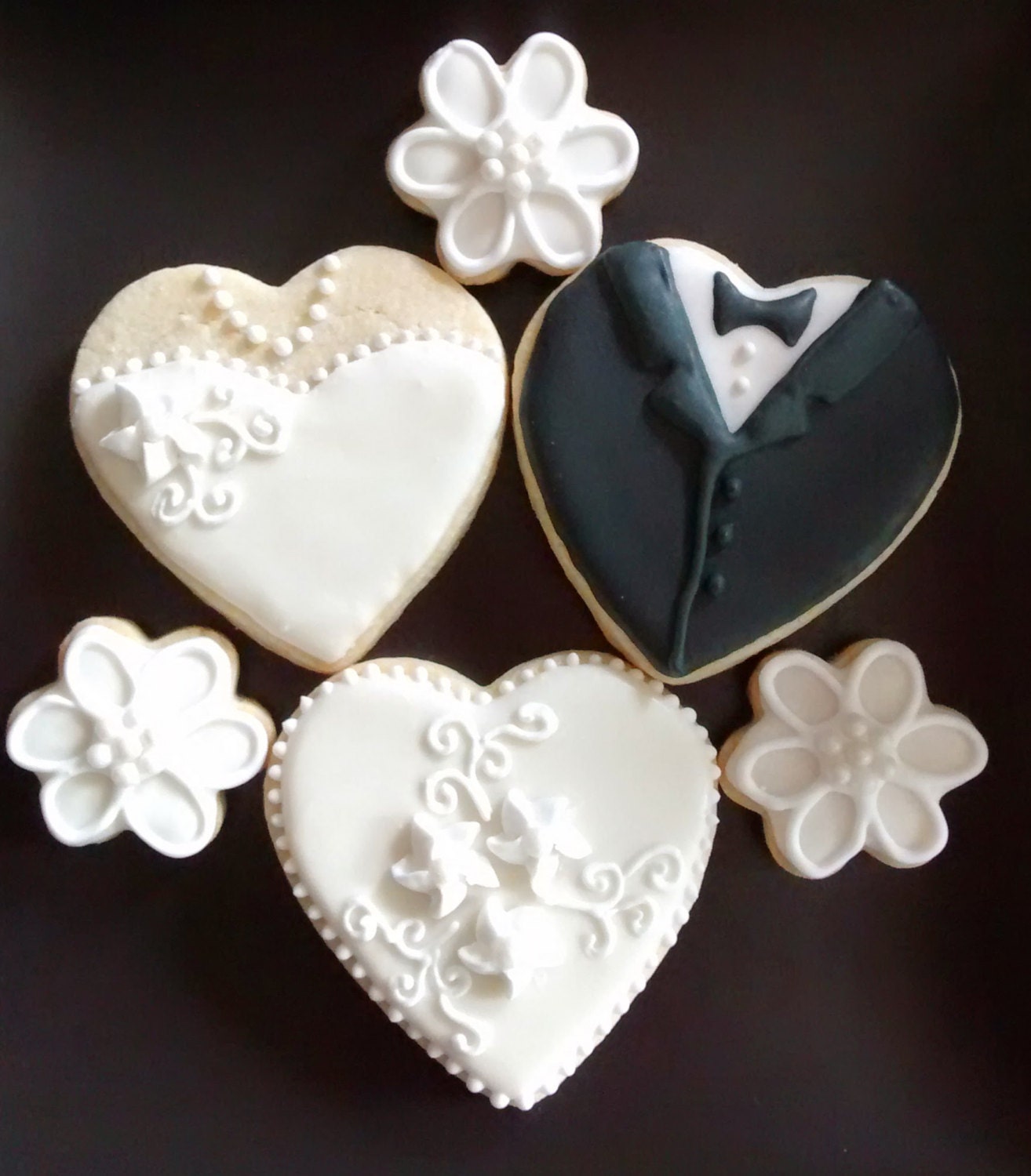 Wedding bride and groom heart cookies and bite size flowers