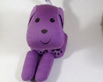 pink and purple stuffed dog