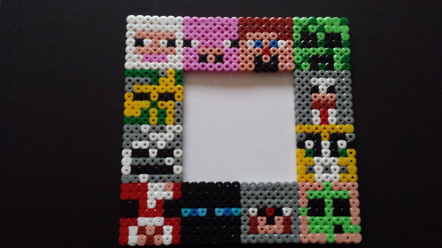 Minecraft character picture frame using Hama beads.