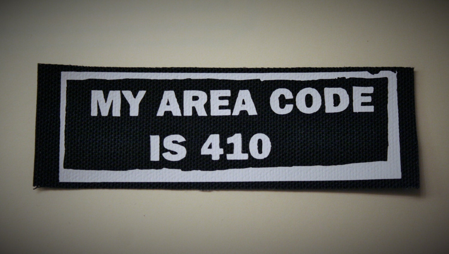 sew-on-black-canvas-patch-with-my-area-code-is-410